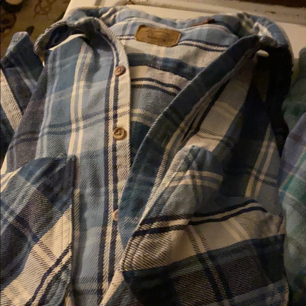 Four flannel shirts